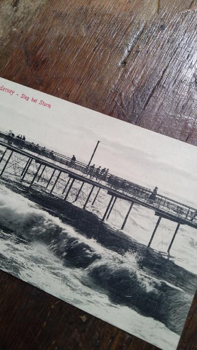 Ansichtspostkarte  Norderney  Steg bei Sturm - Front Cover